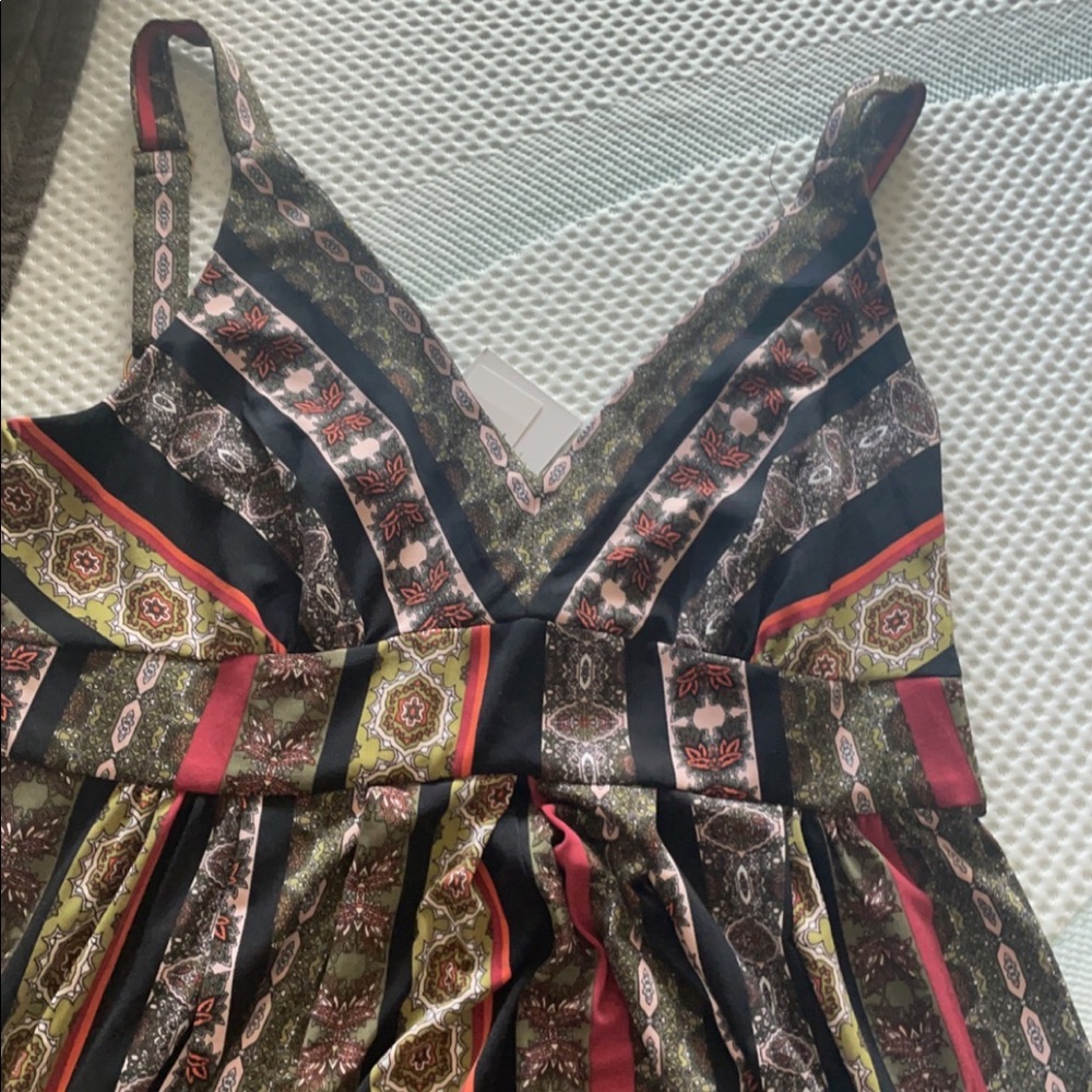 Long Magaschoni sun dress . Heavy material but soft and breathable material.